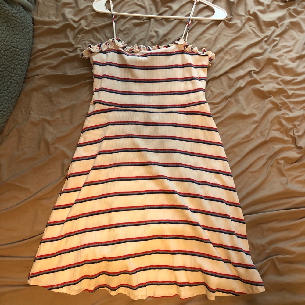 White dress with red grey and blue stripes